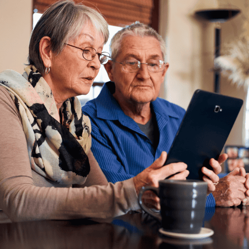 senior couple using a tablet 